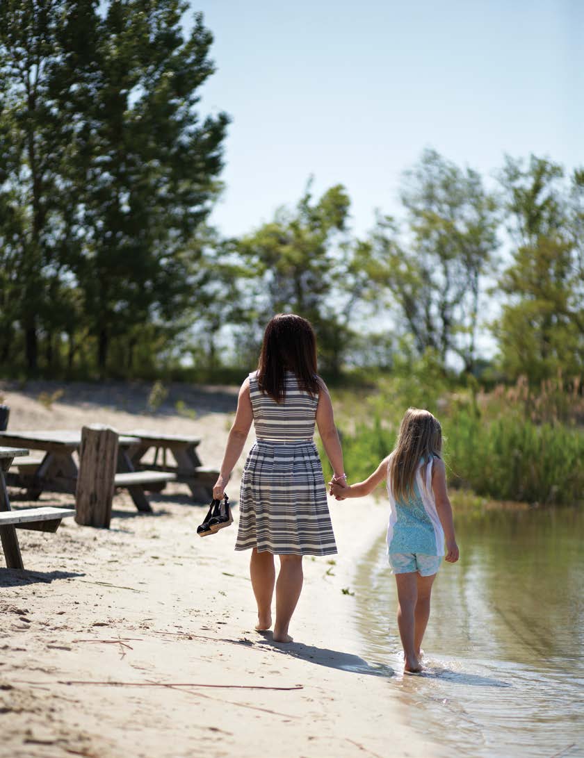 Mother and daughter on the white sand beach at Bob-Lo Island